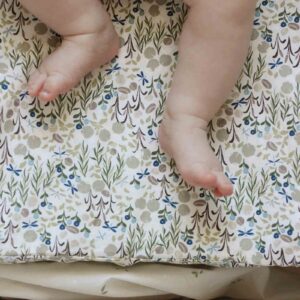 Avery Row baby changing cushion riverbank lifestyle 2